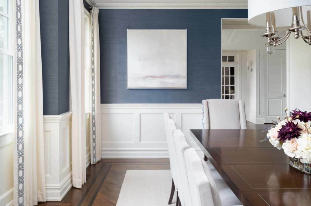 small dining room with wainscoting